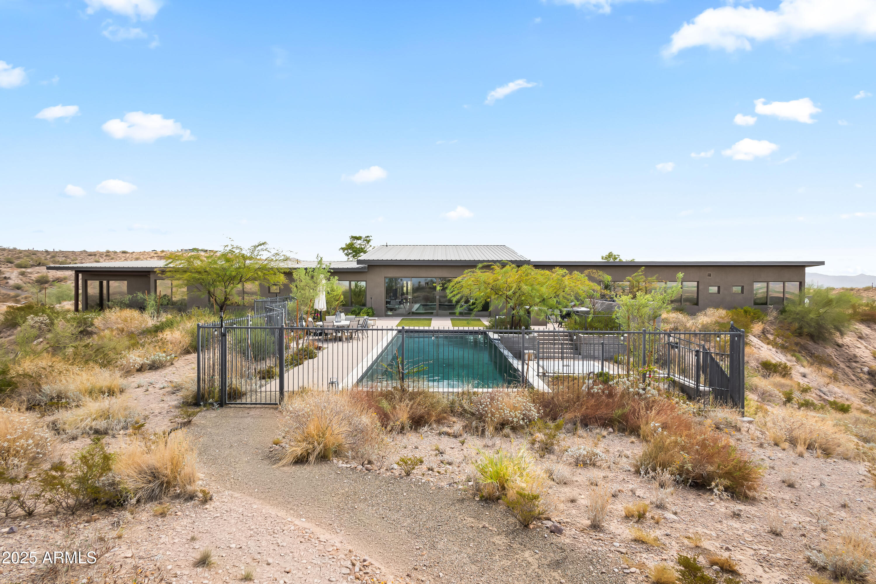 15310 North Sandy Bluff Road Fort McDowell, AZ 85264 - Photo 13 of 53 a view of a swimming pool with a terrace