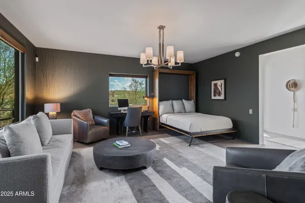 a swimming pool view with a seating space and furniture