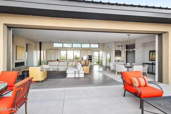 a living room with furniture and a table