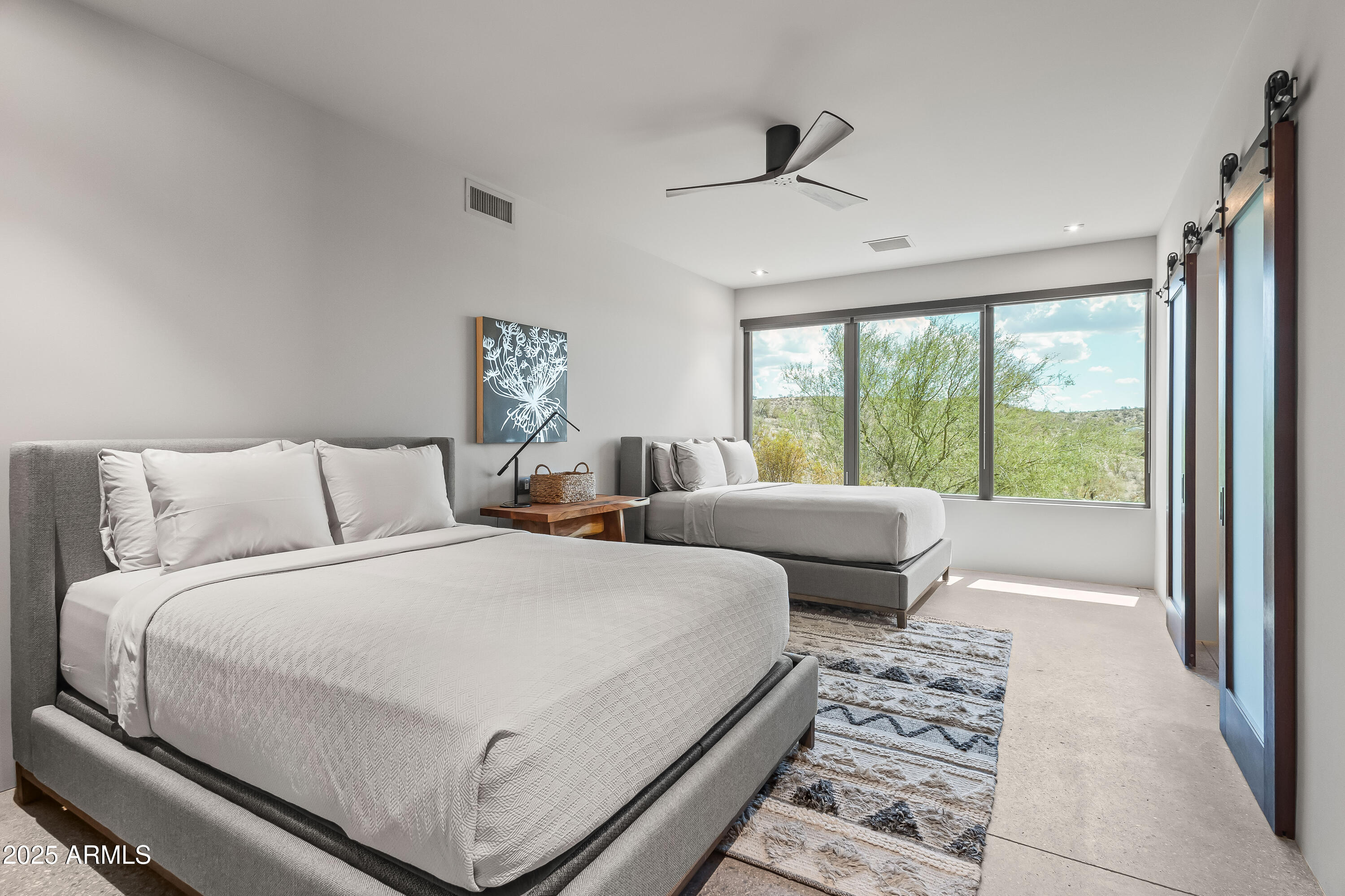 15310 North Sandy Bluff Road Fort McDowell, AZ 85264 - Photo 47 of 53 a bedroom with double bed and a large window