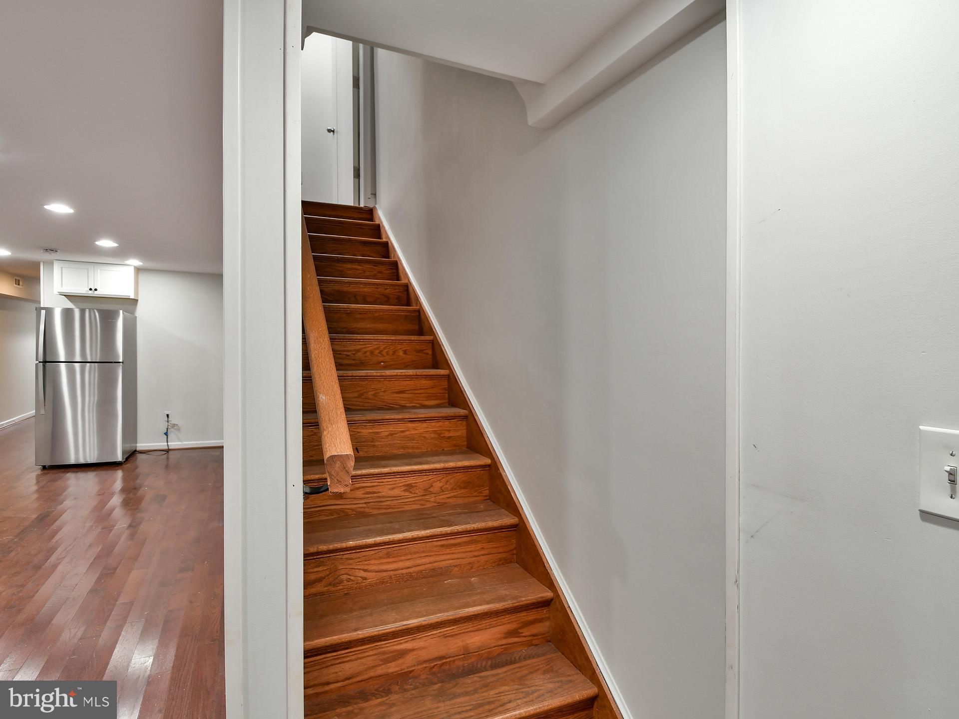 620 Irving Street Northwest, Unit 2 Washington, DC 20010 - Photo 23 of 26 a view of a hallway with wooden floor and entryway