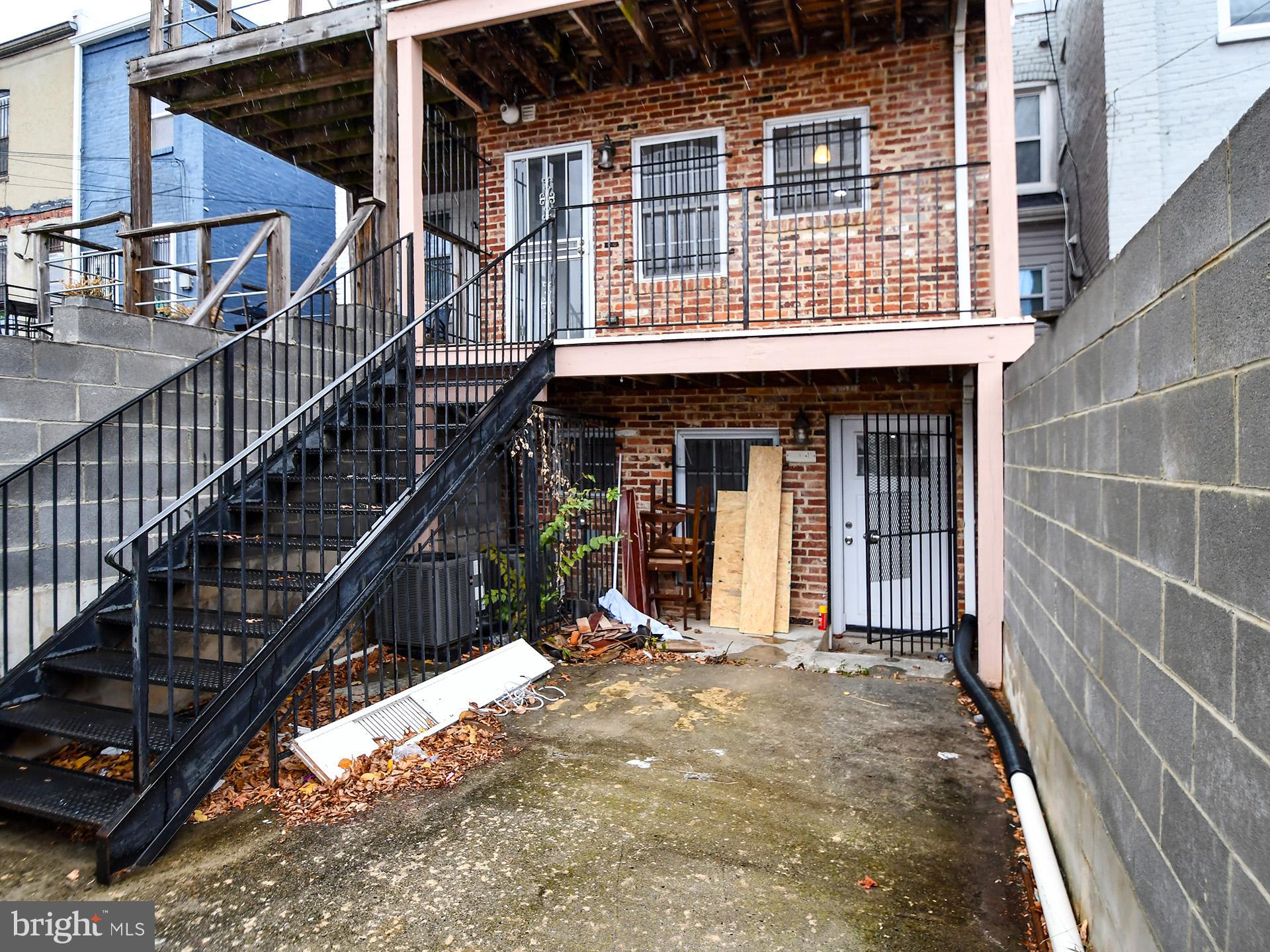 620 Irving Street Northwest, Unit 2 Washington, DC 20010 - Photo 24 of 26 a view of a house with iron stairs