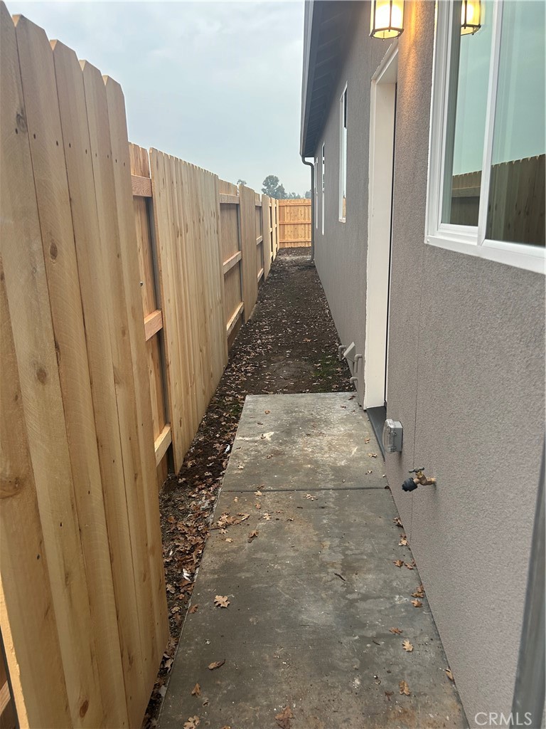 352 Gladstone Chico, CA 95973 - Photo 18 of 22 a view of a pathway of a house with wooden fence