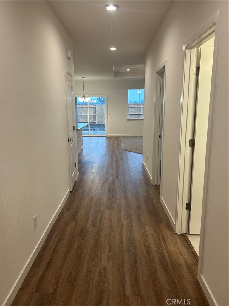 352 Gladstone Chico, CA 95973 - Photo 3 of 22 wooden floor in an empty room with a window