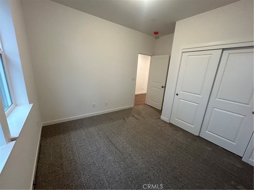 352 Gladstone Chico, CA 95973 - Photo 4 of 22 an empty room with windows