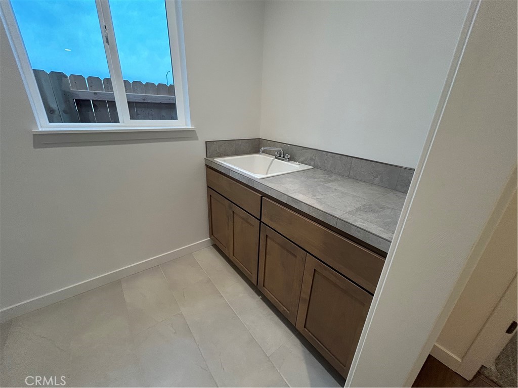 352 Gladstone Chico, CA 95973 - Photo 10 of 22 a kitchen with a sink and a window