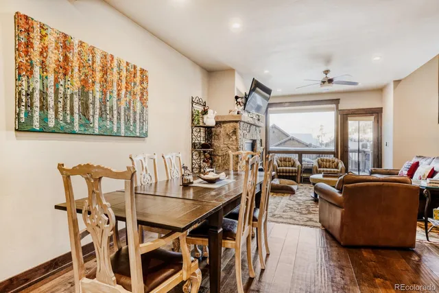 a dining room with furniture and window