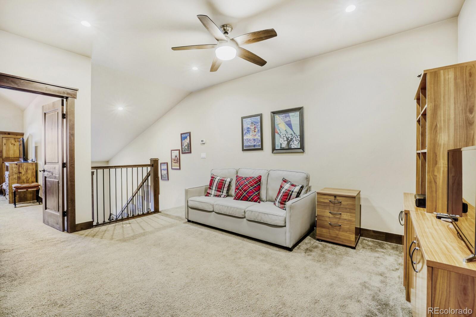 0852 Independence Road Dillon, CO 80435 - Photo 19 of 43 a living room with furniture and a flat screen tv