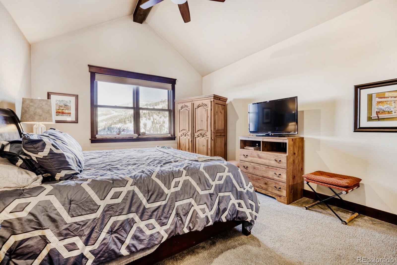 0852 Independence Road Dillon, CO 80435 - Photo 20 of 43 a bedroom with a bed and a television