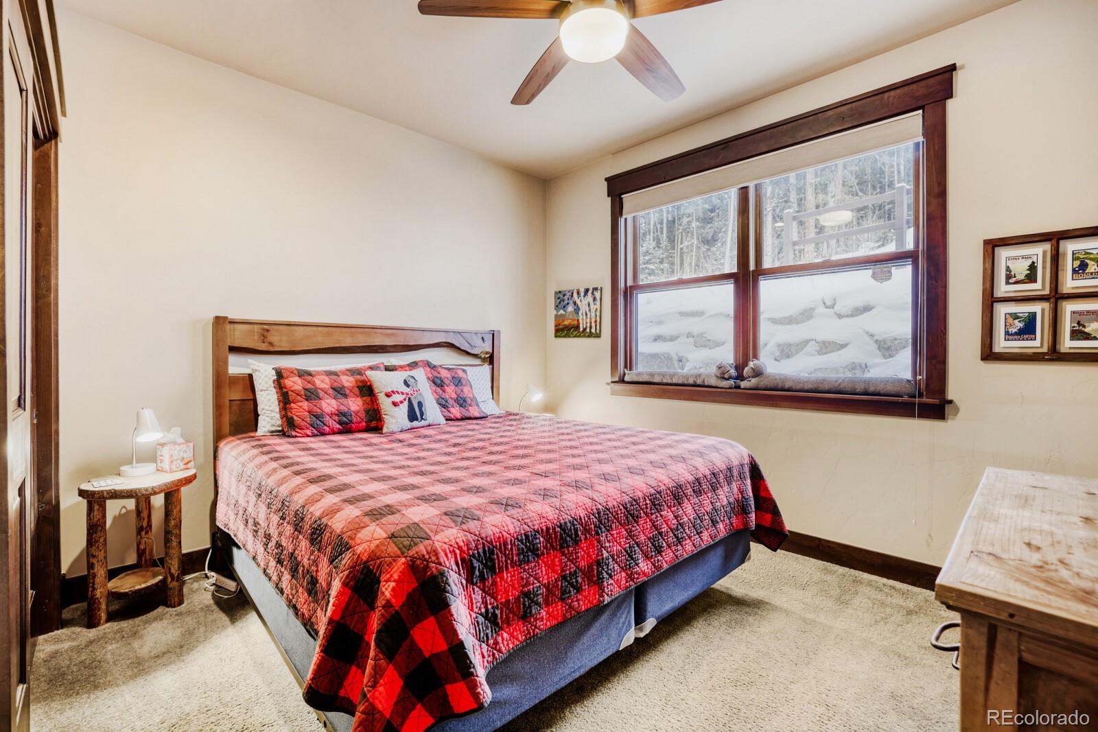 0852 Independence Road Dillon, CO 80435 - Photo 26 of 43 a bedroom with a large bed and a window
