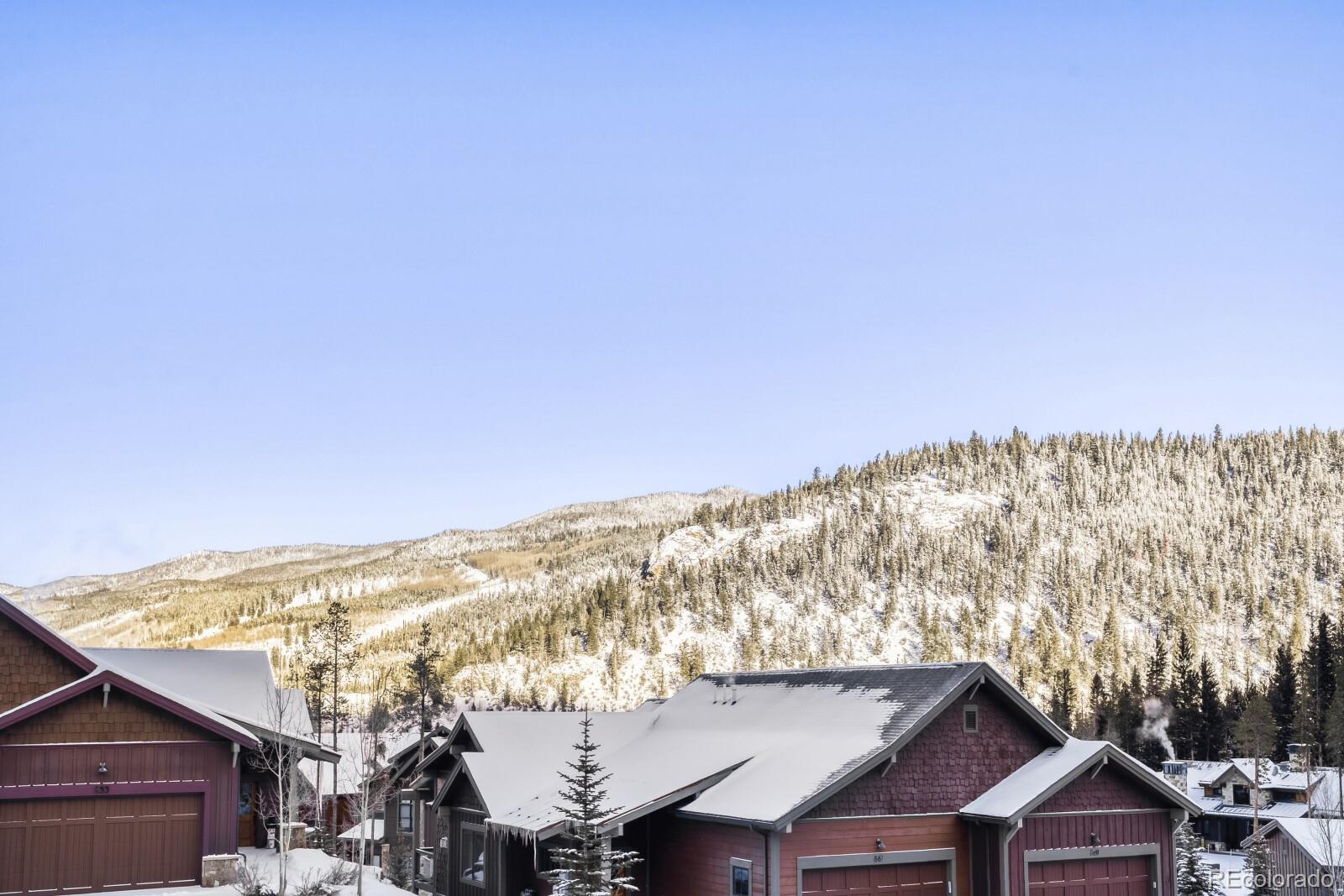 0852 Independence Road Dillon, CO 80435 - Photo 33 of 43 a view of a house with a mountain in the background