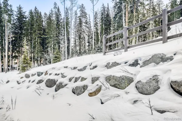 a view of roof and covered with snow