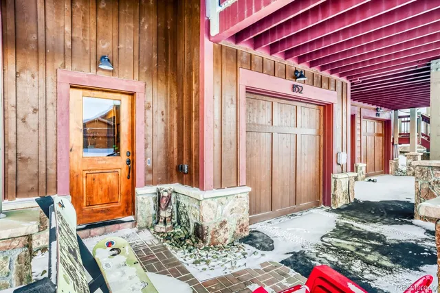 a living room filled with furniture and a window