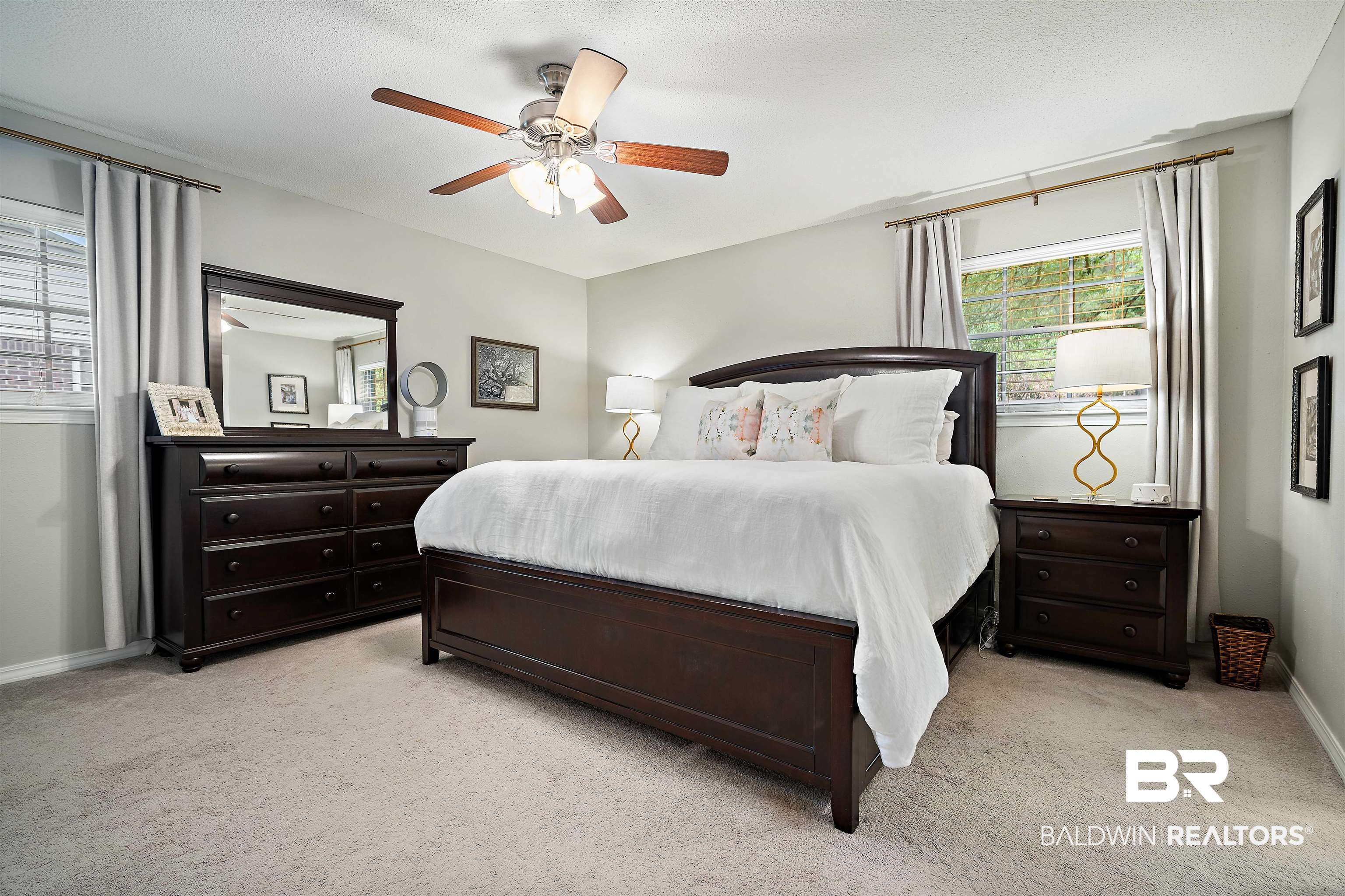 4228 Spring Valley Drive South Mobile, AL 36693 - Photo 16 of 31 Carpeted bedroom featuring ceiling fan and a textured ceiling