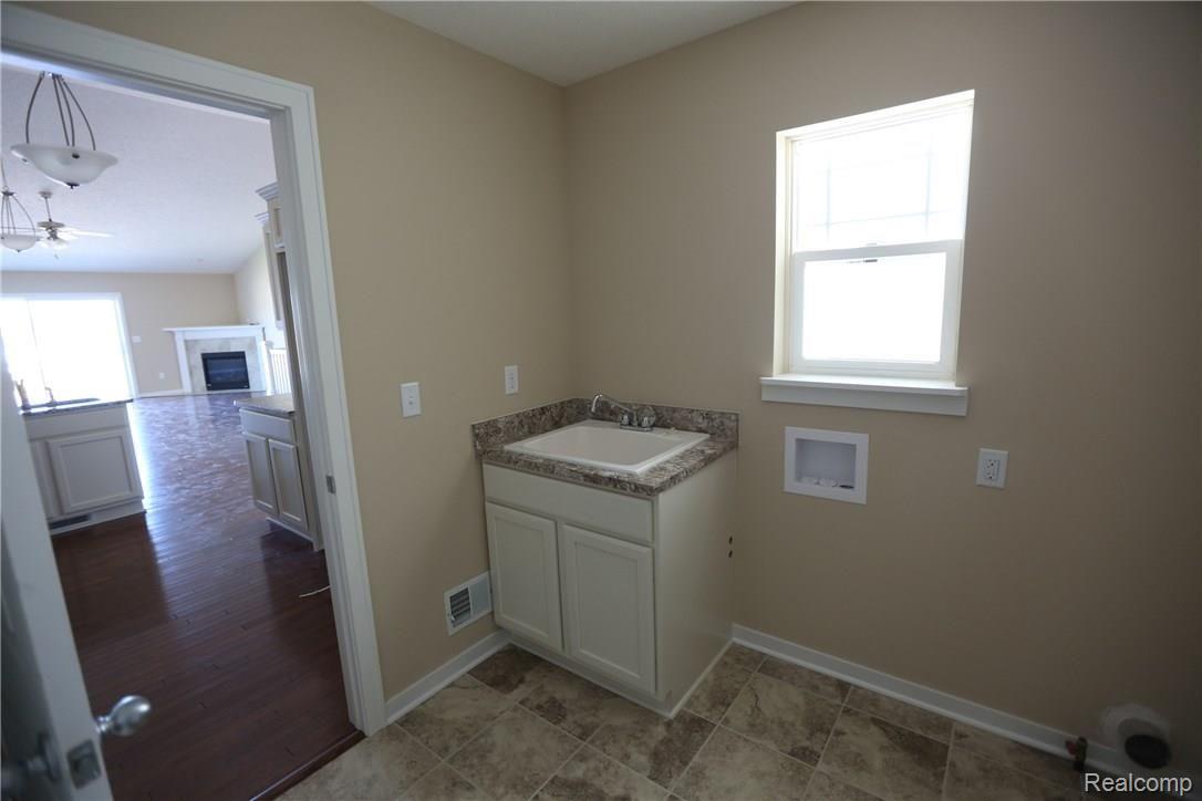 485 Hosta, Unit 86 Howell, MI 48843 - Photo 6 of 11 Please note, pictures are of a different condominium with identical floor plan!