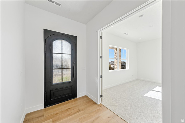 1491 East Centaurus Way, Unit 86 Washington, UT 84780 - Photo 2 of 26 Foyer with light wood-style flooring and baseboards