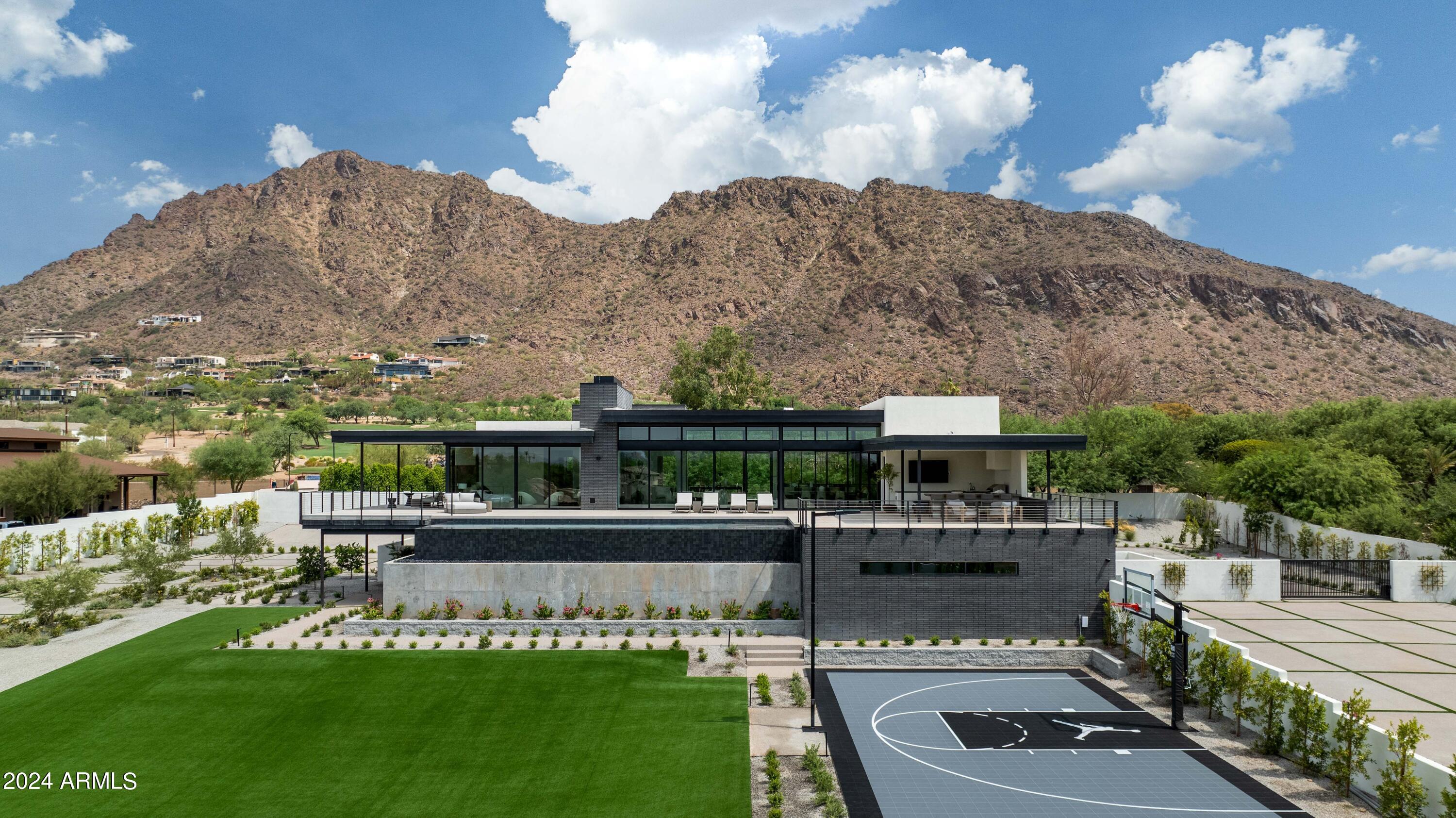 5814 East Camelback Road Phoenix, AZ 85251 - Photo 1 of 1 a view of a house with a yard from a terrace