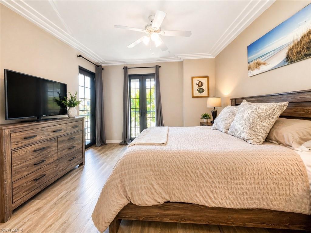 9073 Rialto Street, Unit 6002 Naples, FL 34113 - Photo 13 of 48 Access to balconies/patio from master bedroom