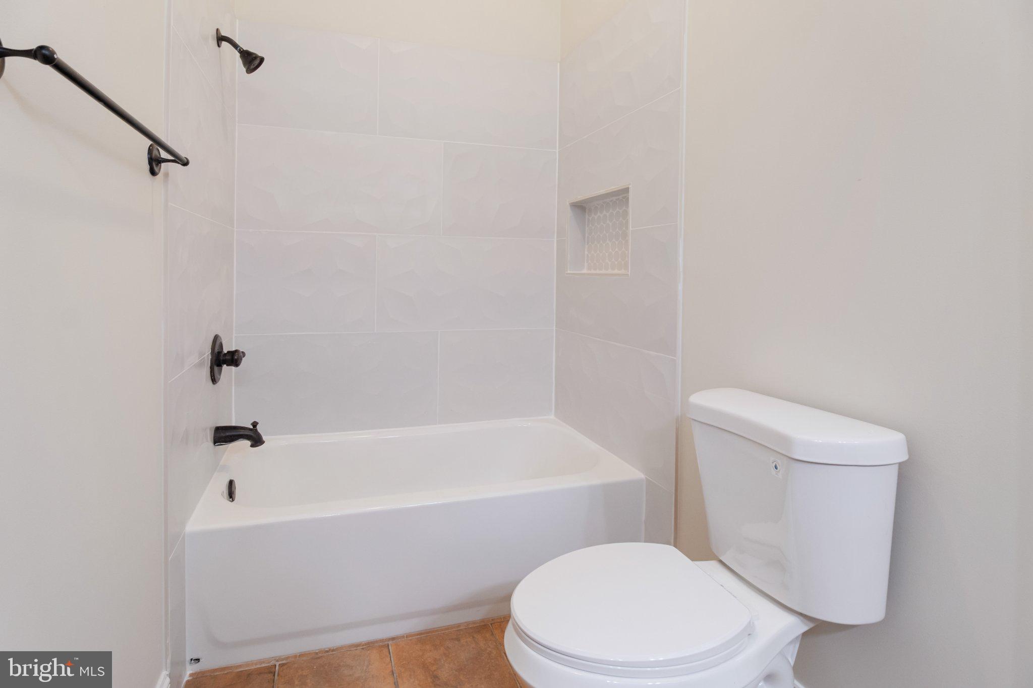 7147 Linganore Road New Market, MD 21774 - Photo 28 of 44 Modern bathroom with sleek finishes.