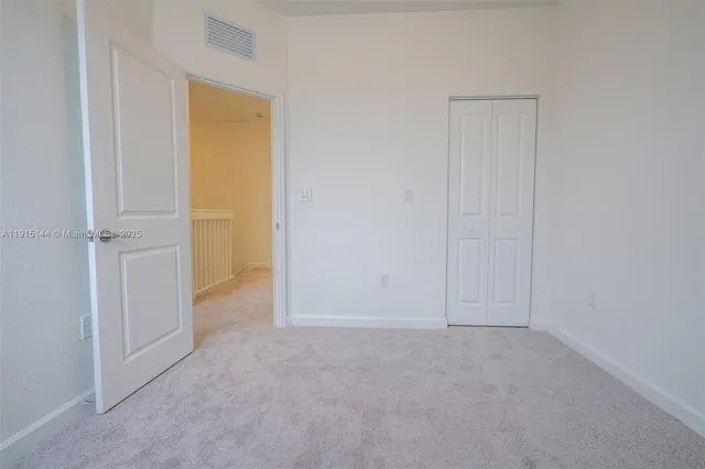 an empty room with closet
