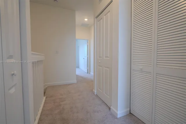 a view of hallway with shower