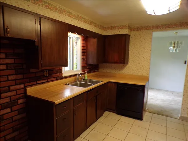 a kitchen with a sink and a cabinets