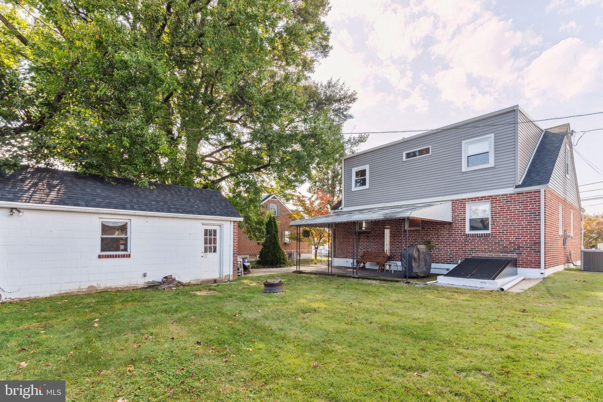320 Rutledge Avenue Folsom, PA 19033 - Photo 16 of 19 Large, fenced in backyard. Detached large garage