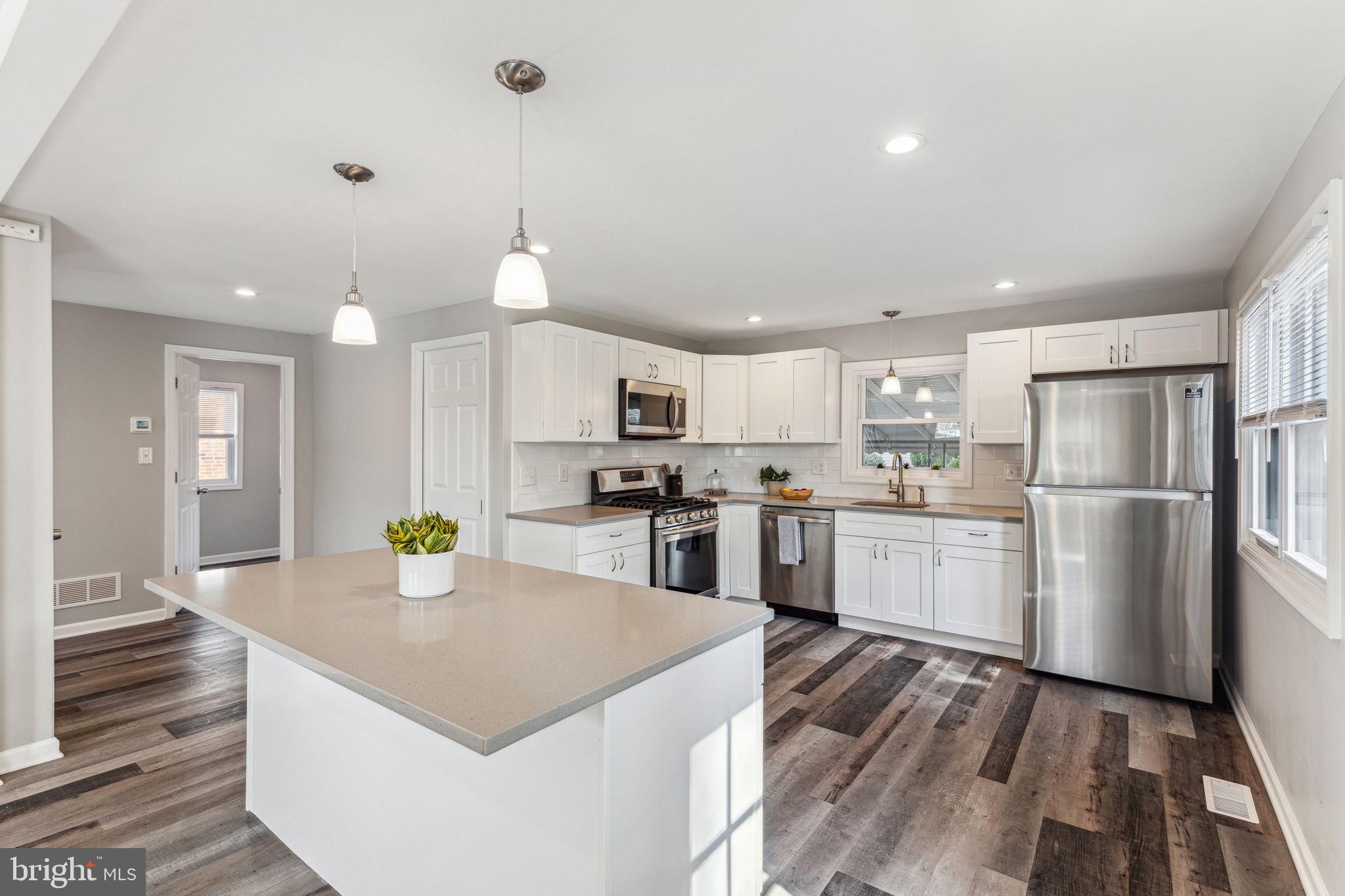 320 Rutledge Avenue Folsom, PA 19033 - Photo 5 of 19 Updated, Modern kitchen with quartz countertops