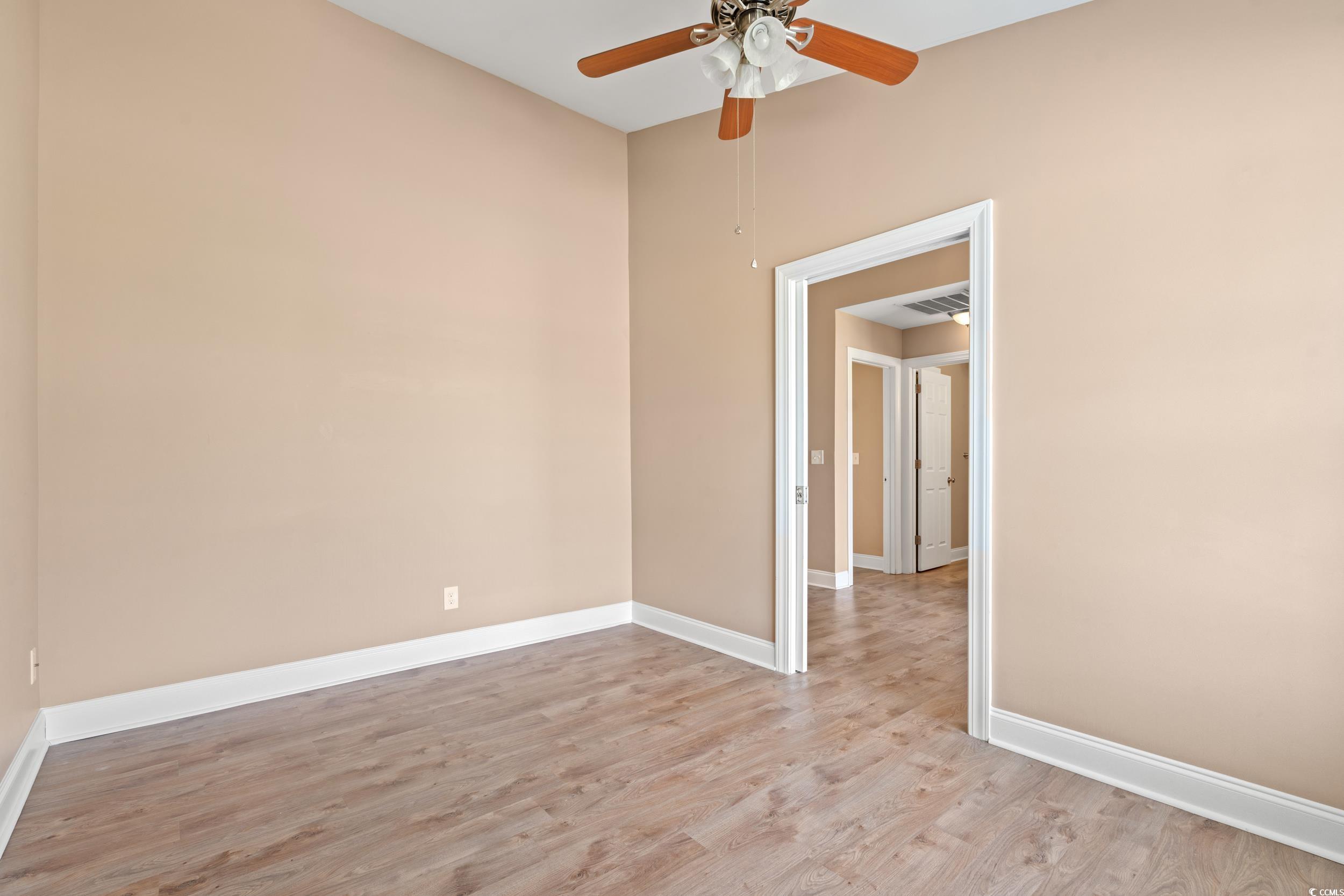 708 Alexis Drive Longs, SC 29568 - Photo 19 of 32 Spare room with light wood-type flooring and a ceiling fan