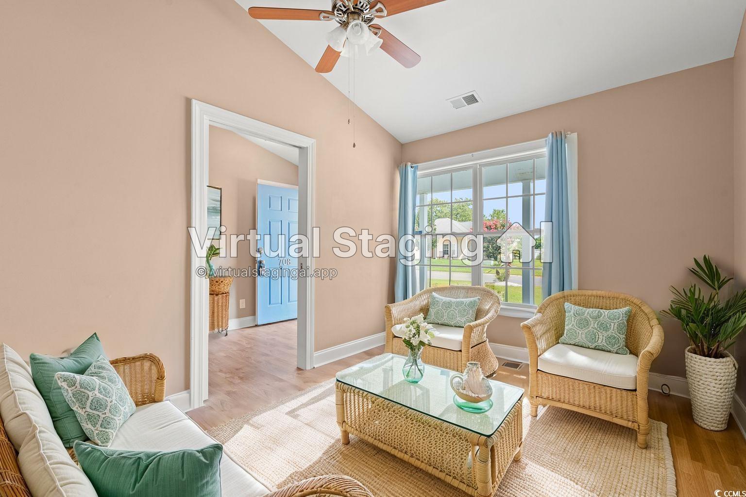 708 Alexis Drive Longs, SC 29568 - Photo 20 of 32 Living area featuring lofted ceiling, ceiling fan, and wood finished floors