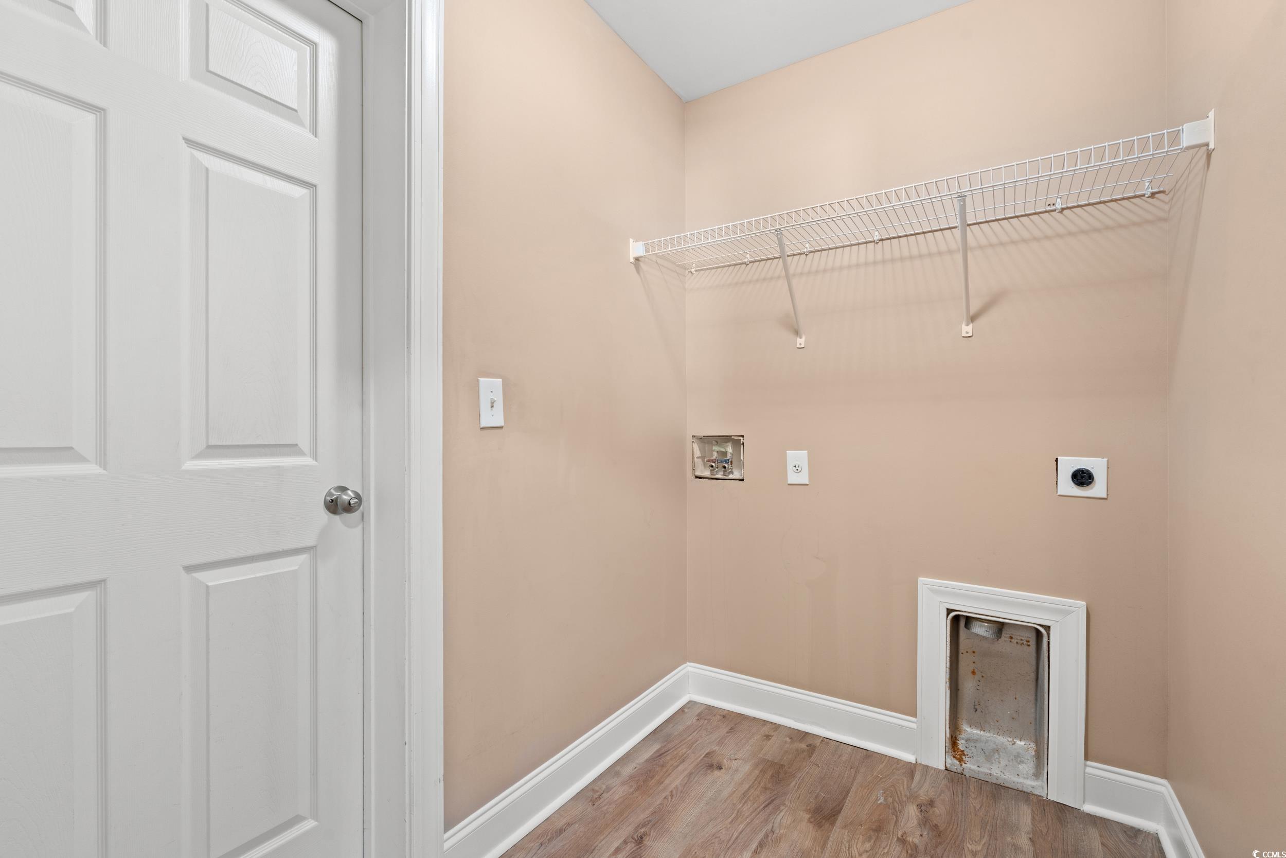 708 Alexis Drive Longs, SC 29568 - Photo 22 of 32 Laundry room with hookup for an electric dryer, hookup for a washing machine, and wood finished floors