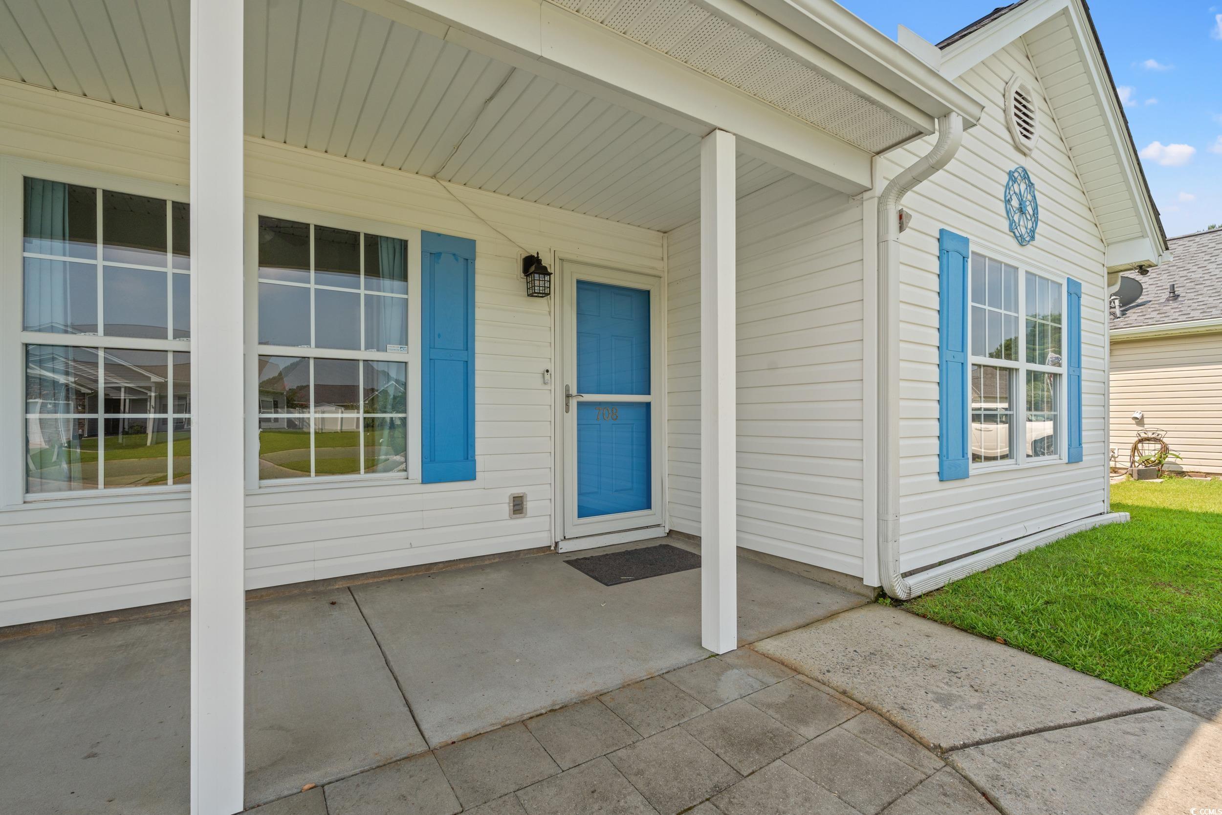 708 Alexis Drive Longs, SC 29568 - Photo 24 of 32 Entrance to property with covered porch
