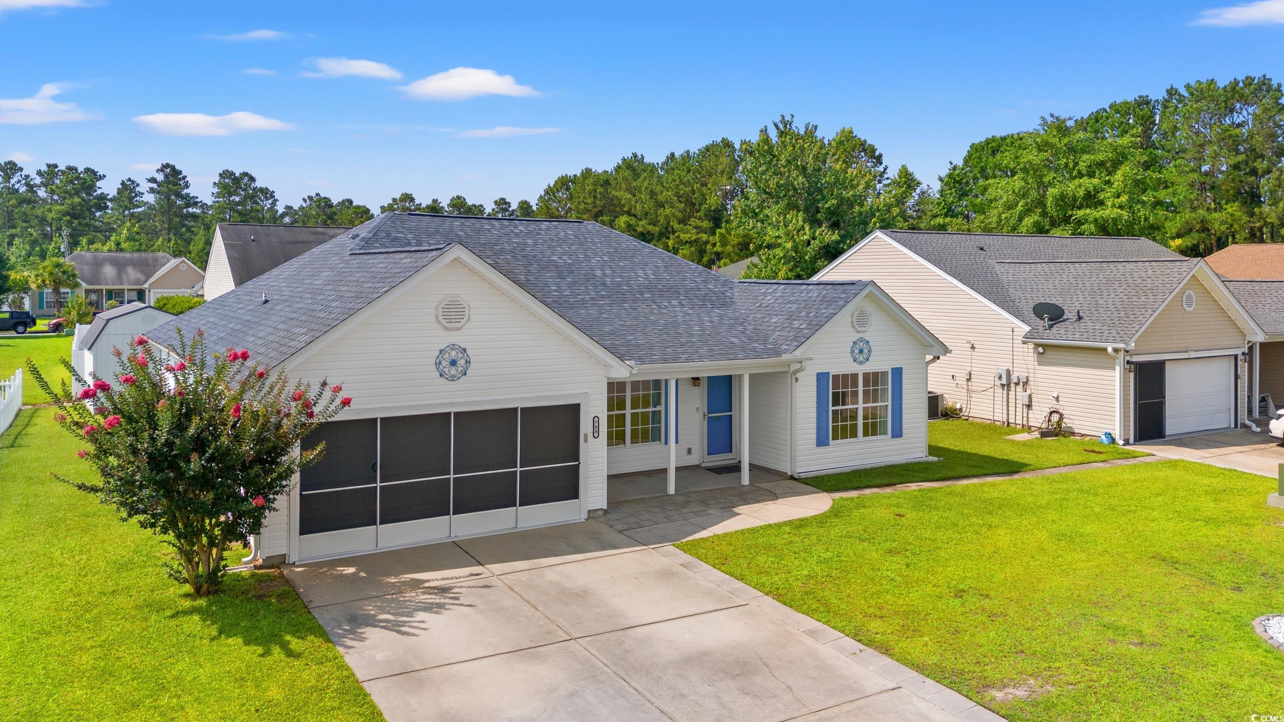 708 Alexis Drive Longs, SC 29568 - Photo 3 of 32 Ranch-style home with roof with shingles, a front yard, a garage, and concrete driveway