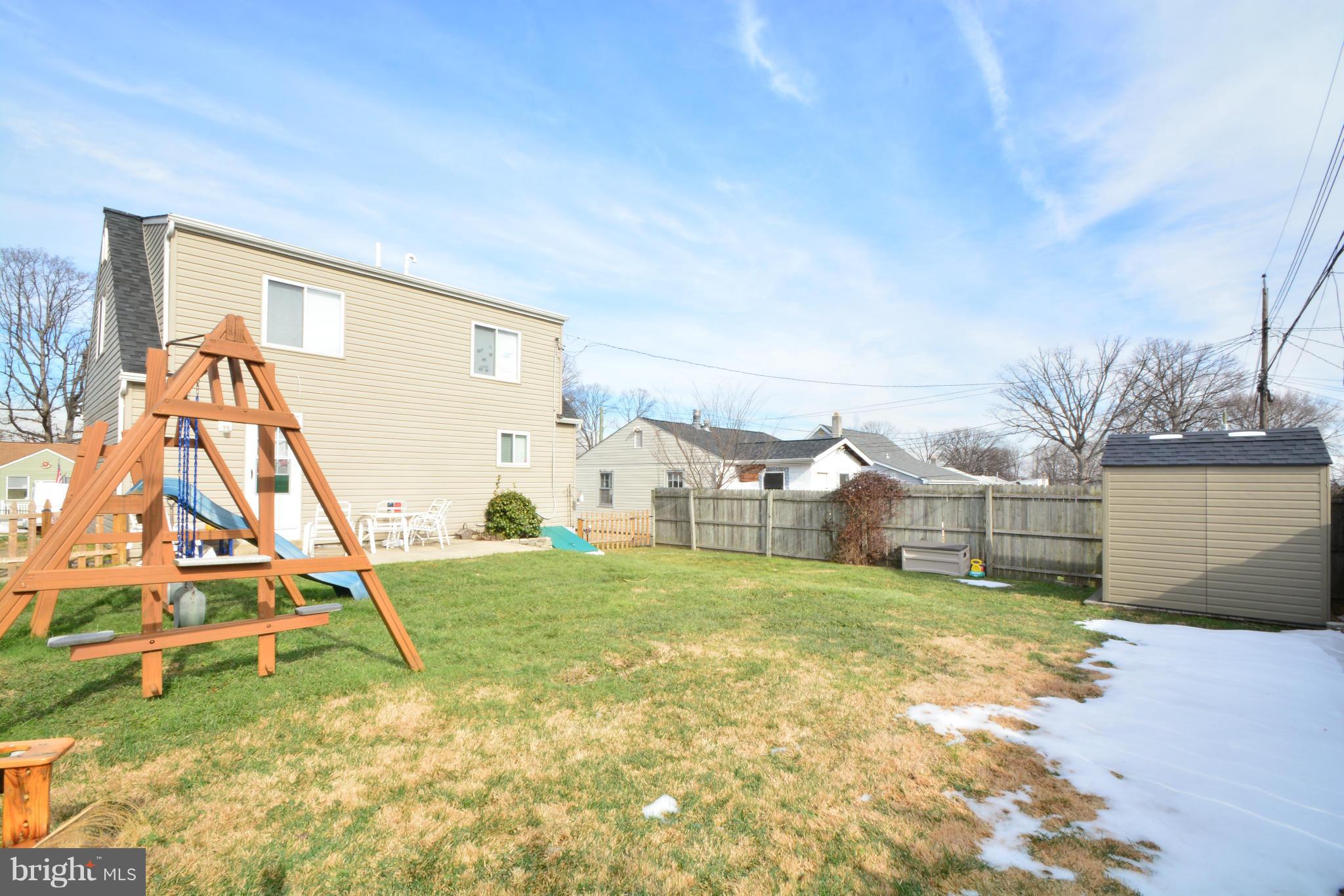 1717 Langley Road Baltimore, MD 21221 - Photo 22 of 24 Large fenced yard with a Shed