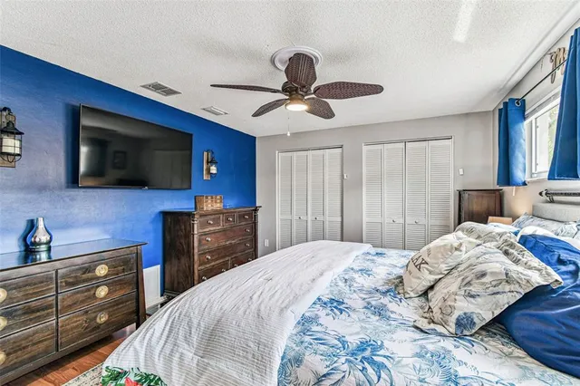 a bathroom with a sink vanity and a mirror