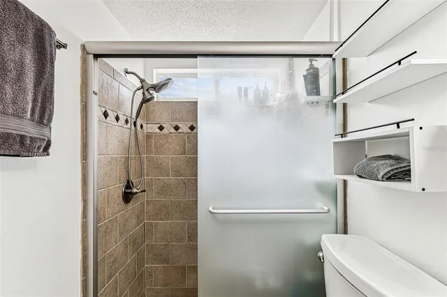 a backyard of a house with outdoor seating