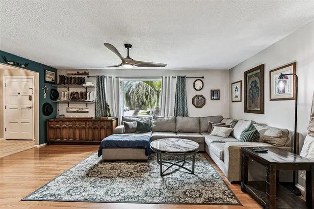 a living room with furniture and a rug