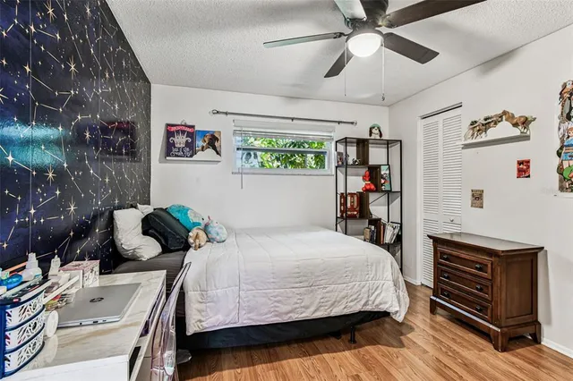 a backyard of a house with outdoor seating