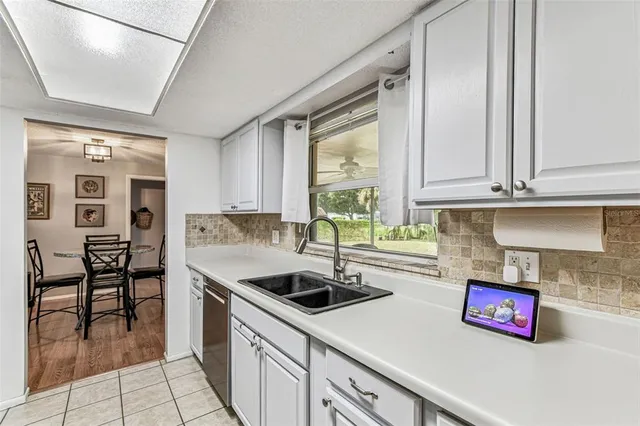 a bedroom with a bed and a bookshelf