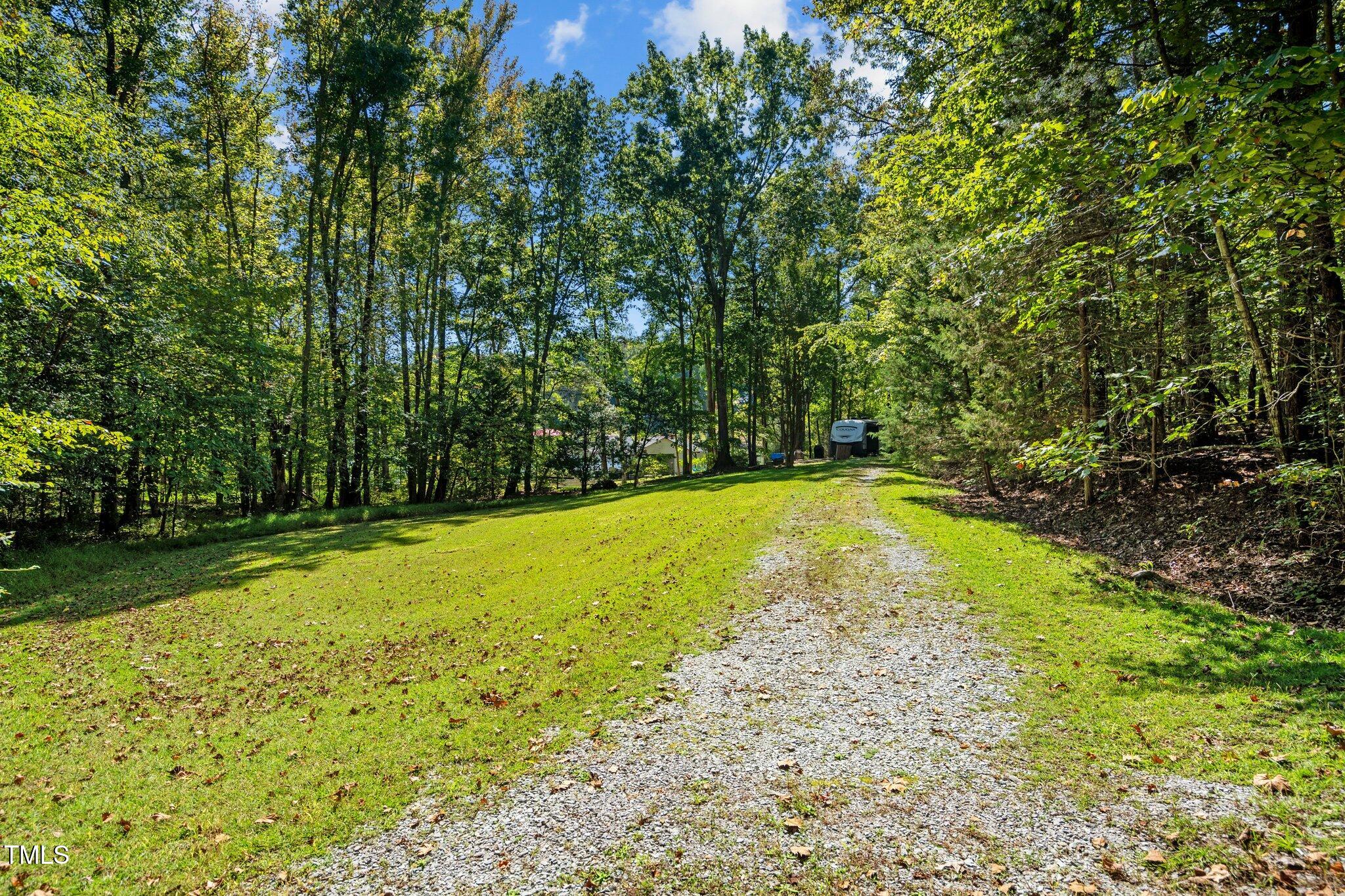 395 Velvet Road Semora, NC 27343 - Photo 15 of 22 Driveway with a circular dirve