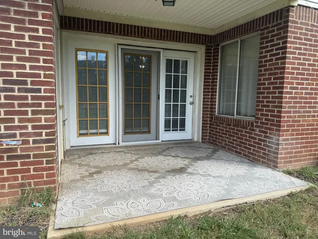 front view of a brick house with a window