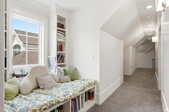71 Farm Road Midway, UT 84049 - Photo 66 of 92 Window seat with integrated shelving, built-in bookcases, recessed lighting, wall sconces, and sloped ceiling details
