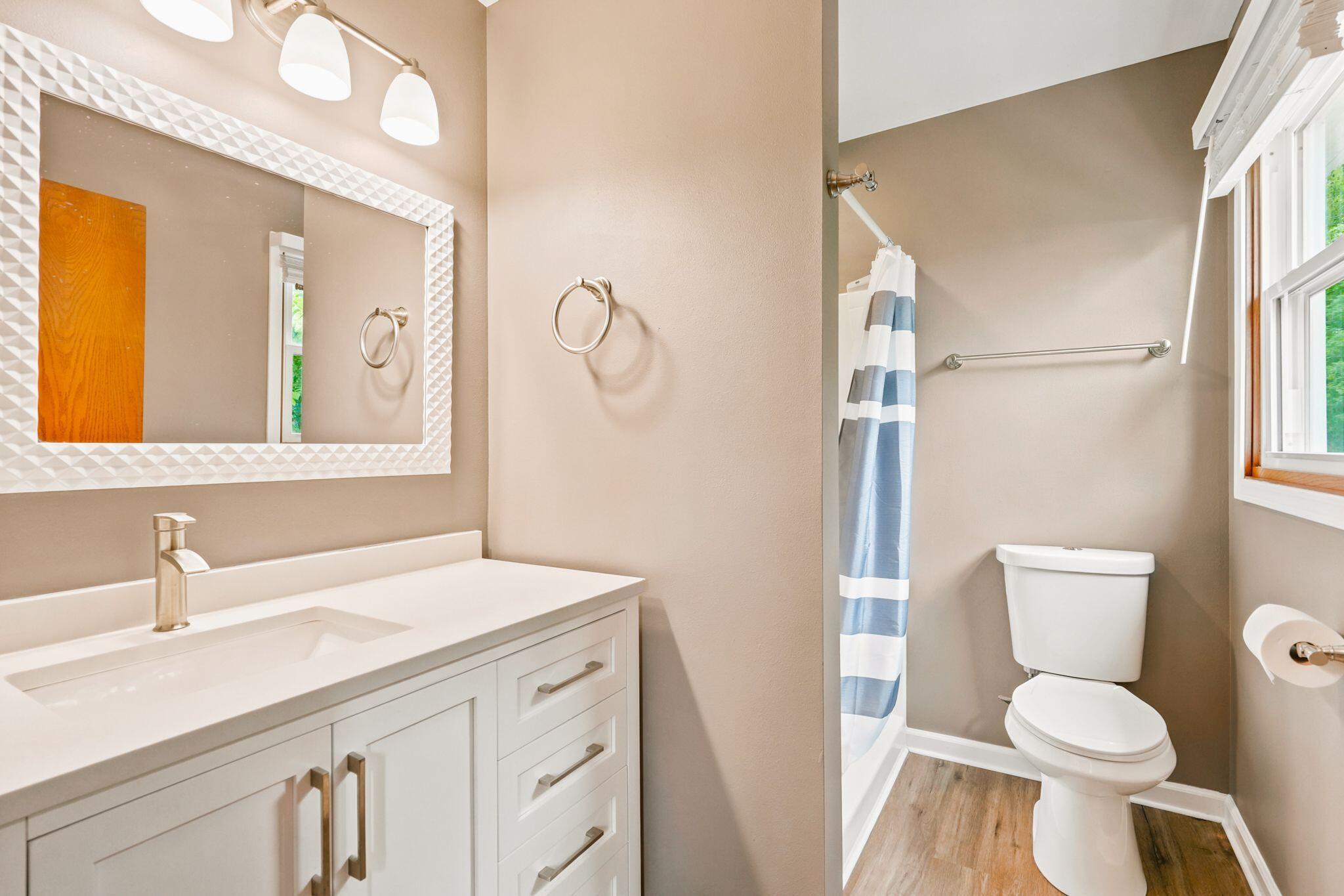 3971 South 118th Street Greenfield, WI 53228 - Photo 25 of 53 Bathroom 2 - Main Level - Shower - Updated Vanity