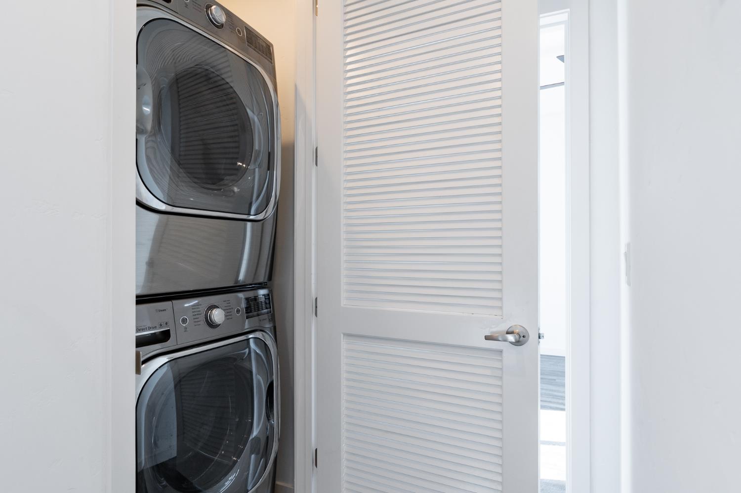 2643 Cleat Lane, Unit 34B Sacramento, CA 95818 - Photo 11 of 39 a close view of a utility room with dryer and washer