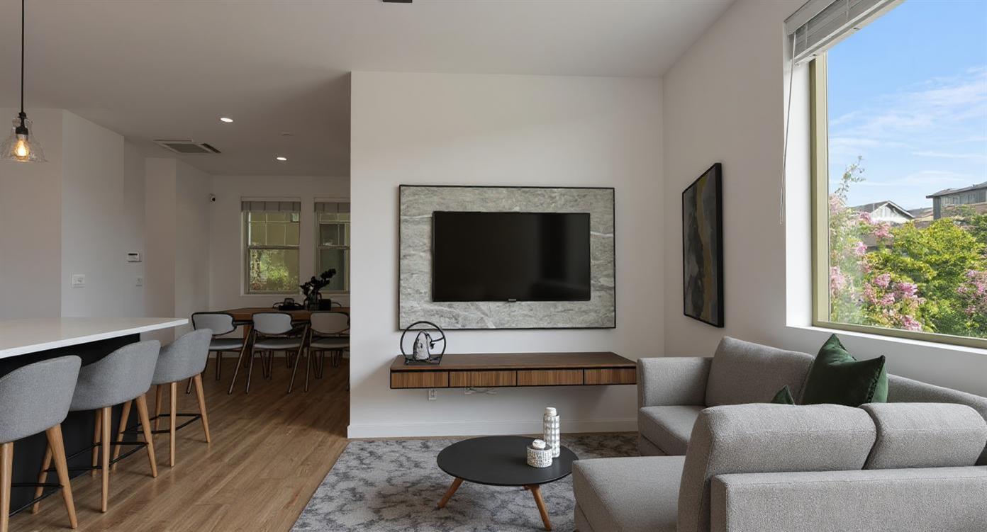 2643 Cleat Lane, Unit 34B Sacramento, CA 95818 - Photo 3 of 39 a living room with furniture and a flat screen tv