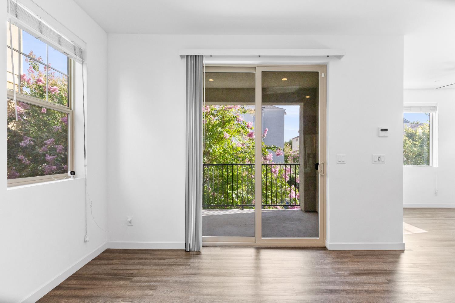 2643 Cleat Lane, Unit 34B Sacramento, CA 95818 - Photo 9 of 39 a view of room with wooden floor and garden view