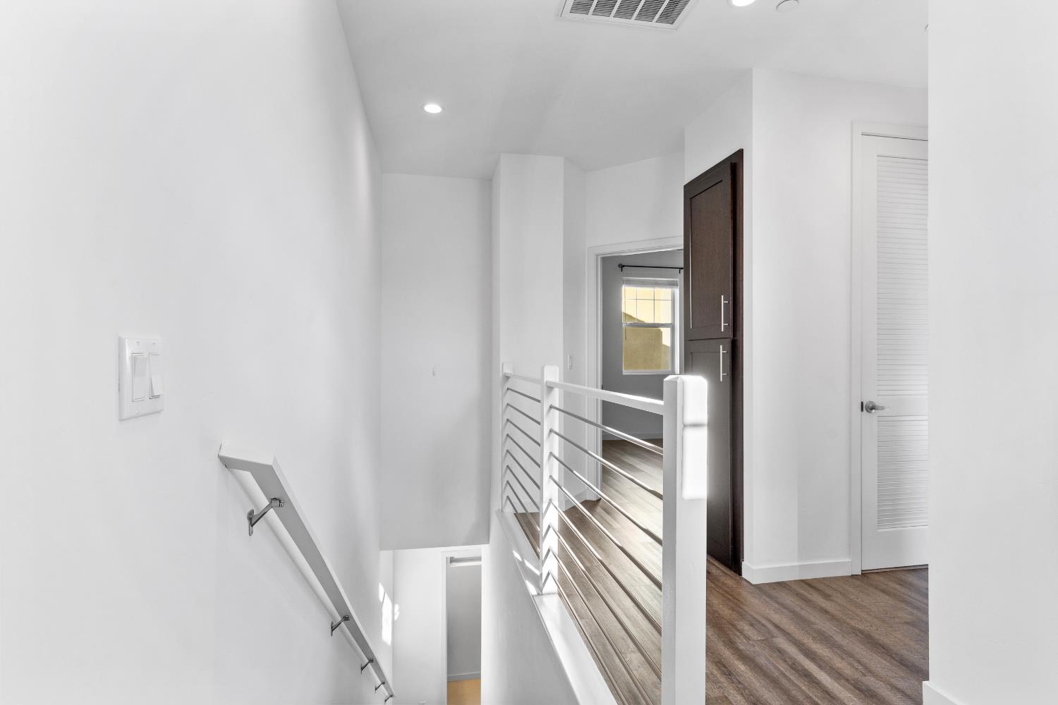 2643 Cleat Lane, Unit 34B Sacramento, CA 95818 - Photo 10 of 39 a view of an entryway with wooden floor