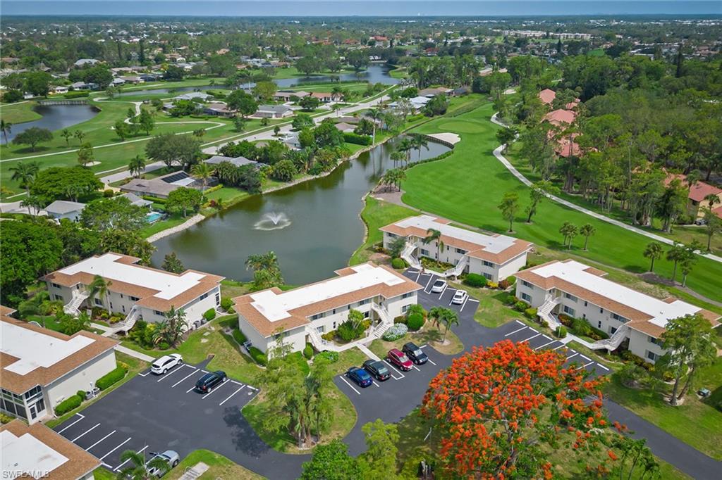 448 Teryl Road, Unit 2341 Naples, FL 34112 - Photo 23 of 32 an aerial view of a house with a garden