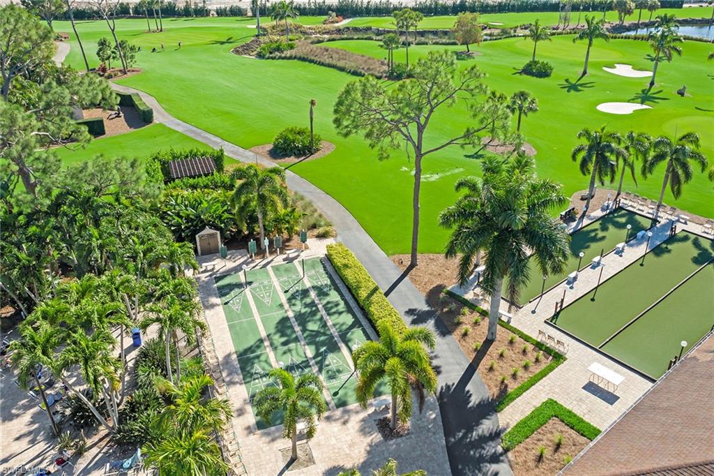 448 Teryl Road, Unit 2341 Naples, FL 34112 - Photo 29 of 32 a view of a garden with an outdoor space
