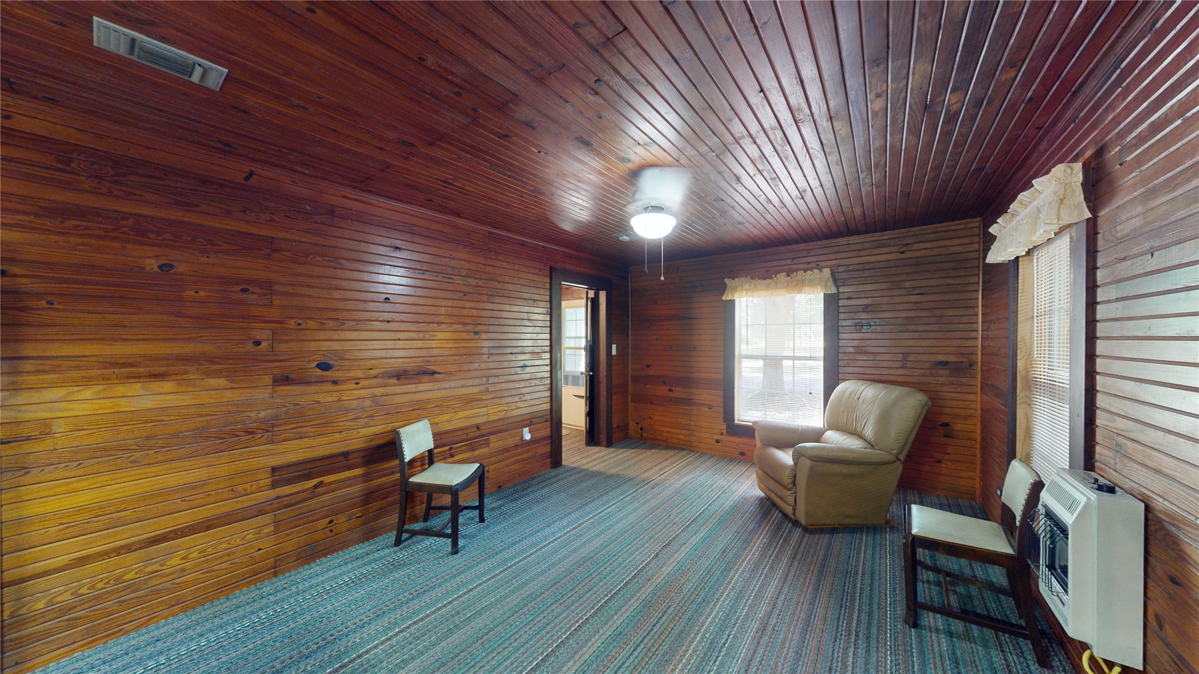 18157 State Highway 87 Call, TX 75933 - Photo 5 of 39 a balcony with furniture and wooden floor